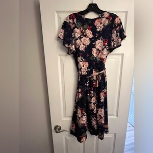 Mai Soli dress   Pretty navy floral print with flattering wrap front.